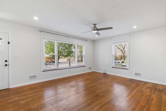 250 E Park St, Westerville, OH 43081 - unfurnished room with hardwood / wood-style floors, plenty of natural light, a ceiling fan, and visible vents