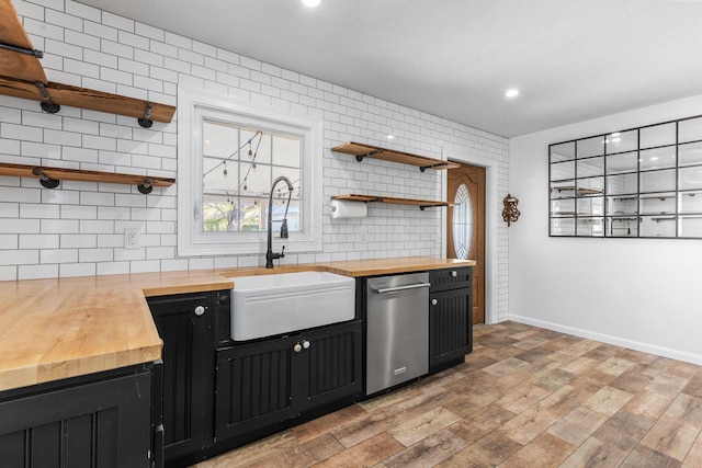 250 E Park St, Westerville, OH 43081 - kitchen featuring a sink, open shelves, wooden counters, dishwasher, and dark cabinets