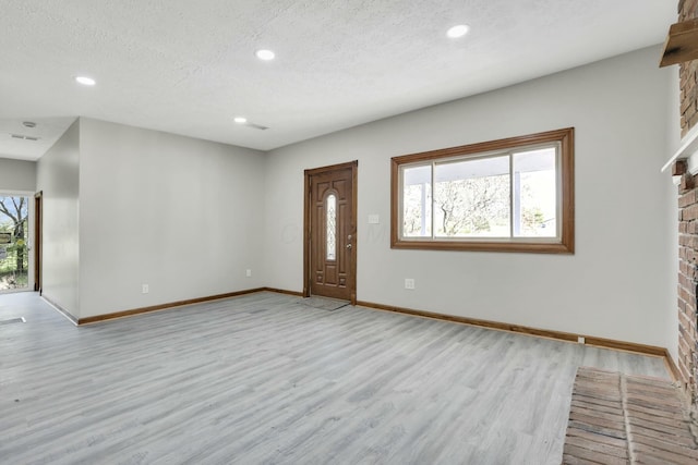 3907 Condit Rd, Sunbury, OH 43074 - foyer with recessed lighting, light wood-style flooring, and baseboards
