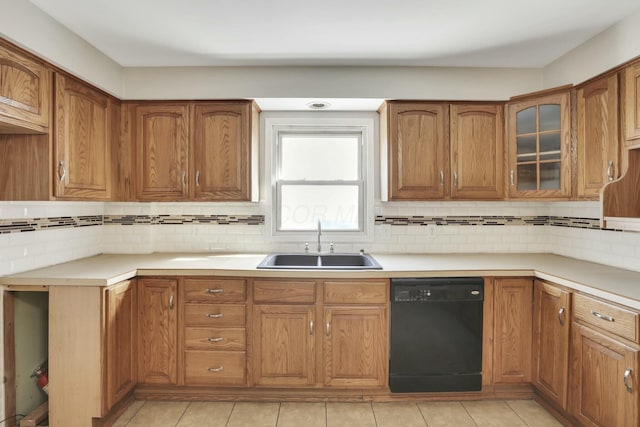 3907 Condit Rd, Sunbury, OH 43074 - kitchen with dishwasher, brown cabinets, backsplash, and a sink