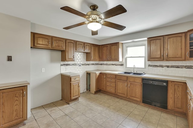 3907 Condit Rd, Sunbury, OH 43074 - kitchen featuring brown cabinetry, backsplash, black dishwasher, and a sink