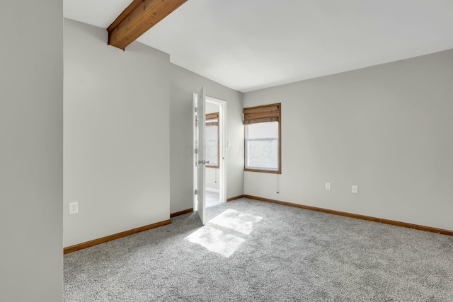 3907 Condit Rd, Sunbury, OH 43074 - interior space featuring baseboards, carpet flooring, and beam ceiling