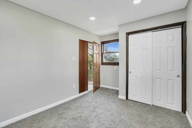 3907 Condit Rd, Sunbury, OH 43074 - unfurnished bedroom with recessed lighting, carpet, a closet, and baseboards