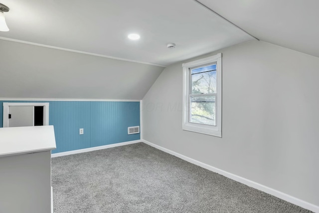 3907 Condit Rd, Sunbury, OH 43074 - bonus room featuring baseboards, vaulted ceiling, visible vents, and carpet