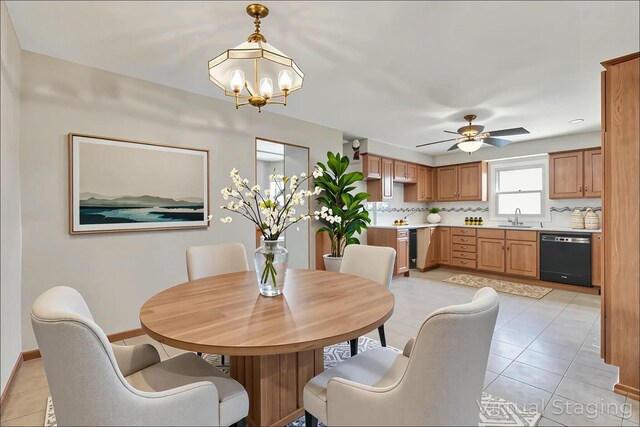 3907 Condit Rd, Sunbury, OH 43074 - dining room featuring light tile patterned flooring, baseboards, and ceiling fan with notable chandelier