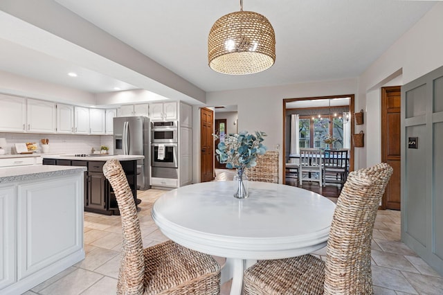 dining room featuring a chandelier