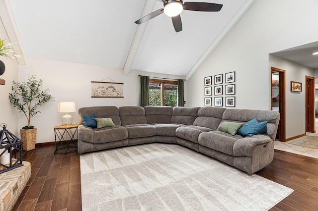 living room with wood finished floors, ceiling fan, baseboards, high vaulted ceiling, and beamed ceiling