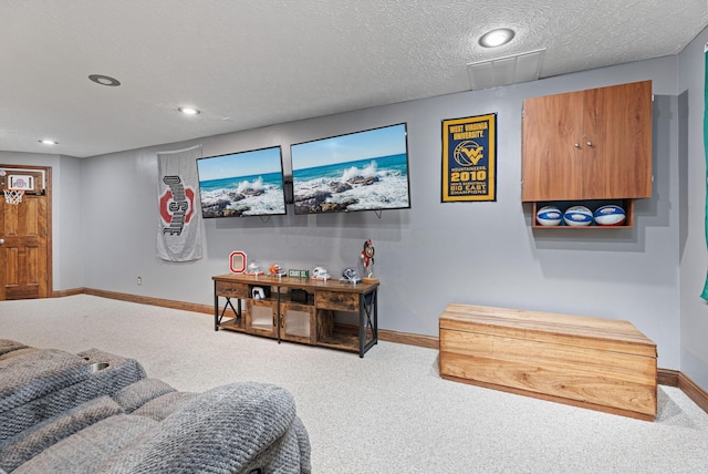 carpeted living area featuring baseboards, recessed lighting, and a textured ceiling