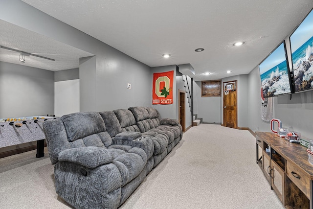 living area with carpet, baseboards, recessed lighting, a textured ceiling, and stairway