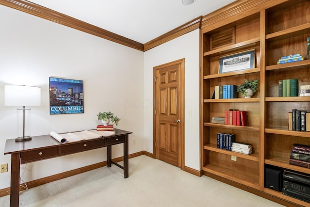 home office featuring baseboards, ornamental molding, and light carpet
