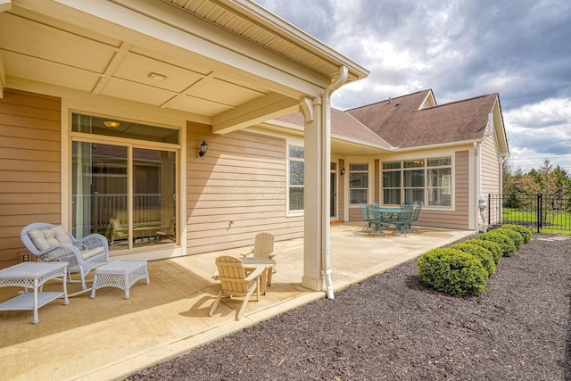 view of patio / terrace with fence