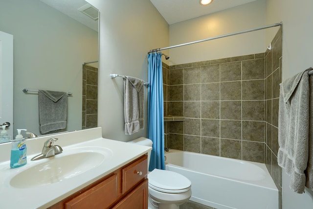 full bath with vanity, shower / bathtub combination with curtain, visible vents, and toilet