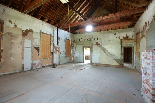 2263 Amity Rd, Hilliard, OH 43026 - unfurnished room with wood finished floors and high vaulted ceiling