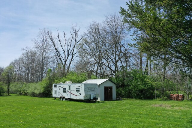 2263 Amity Rd, Hilliard, OH 43026 - view of yard with an outdoor structure and a storage unit