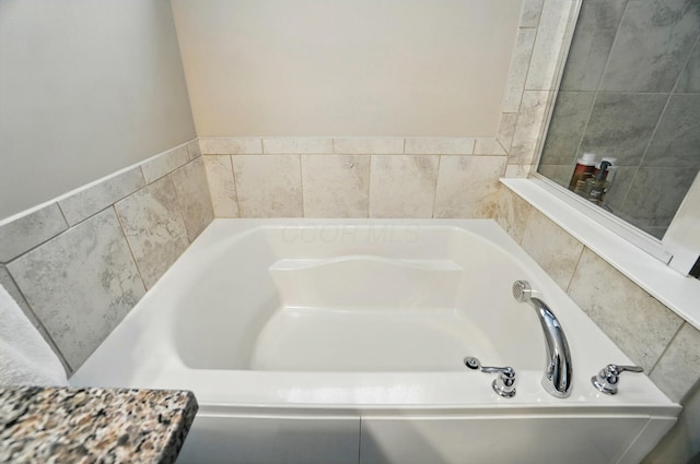 full bathroom featuring a bath