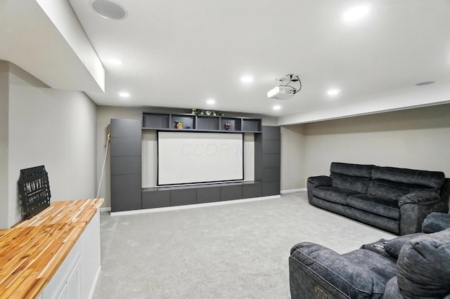 carpeted cinema featuring recessed lighting and baseboards