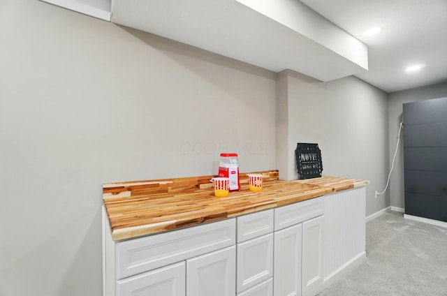 bar with baseboards, recessed lighting, and light colored carpet