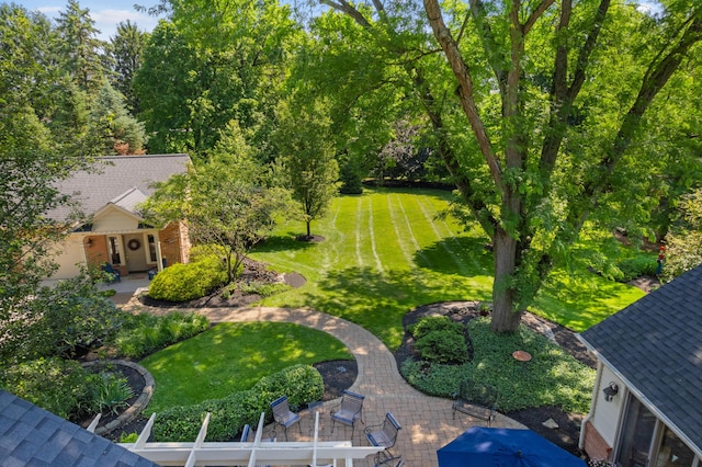 4318 Lyon Dr, Upper Arlington, OH 43220 - view of grassy yard with a patio