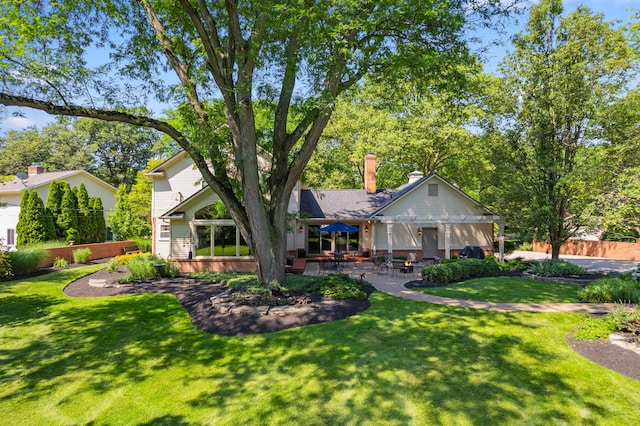 4318 Lyon Dr, Upper Arlington, OH 43220 - back of house featuring a patio area and a chimney