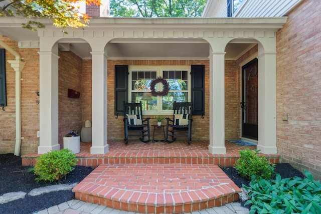 4318 Lyon Dr, Upper Arlington, OH 43220 - property entrance with a porch and brick siding