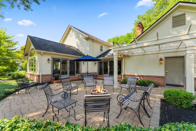 4318 Lyon Dr, Upper Arlington, OH 43220 - view of patio featuring an outdoor fire pit and a pergola