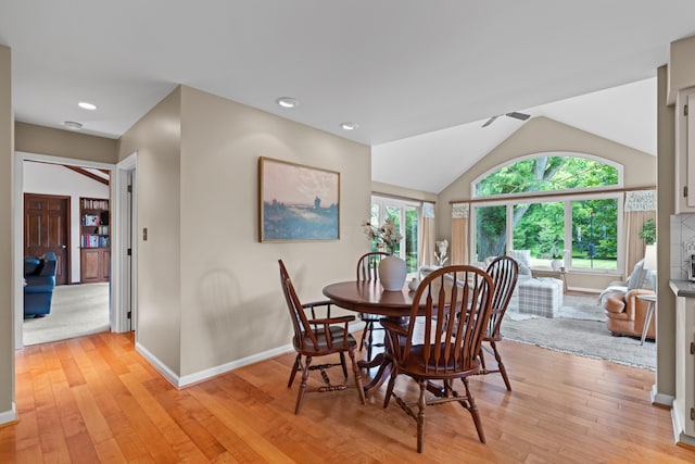 4318 Lyon Dr, Upper Arlington, OH 43220 - dining area with light wood-style flooring, vaulted ceiling, and a ceiling fan