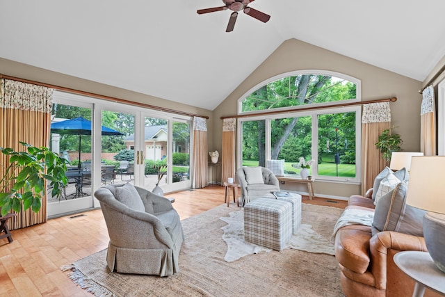 4318 Lyon Dr, Upper Arlington, OH 43220 - living room with a ceiling fan, healthy amount of natural light, high vaulted ceiling, wood finished floors, and french doors