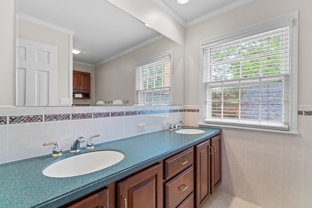 4318 Lyon Dr, Upper Arlington, OH 43220 - full bathroom featuring tile walls, double vanity, crown molding, and a wainscoted wall