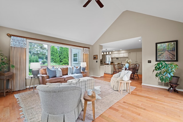 4318 Lyon Dr, Upper Arlington, OH 43220 - living area featuring high vaulted ceiling, ceiling fan, and light wood-type flooring