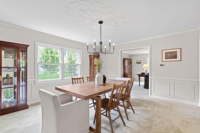 4318 Lyon Dr, Upper Arlington, OH 43220 - dining room with light carpet, a chandelier, ornamental molding, a wainscoted wall, and a decorative wall