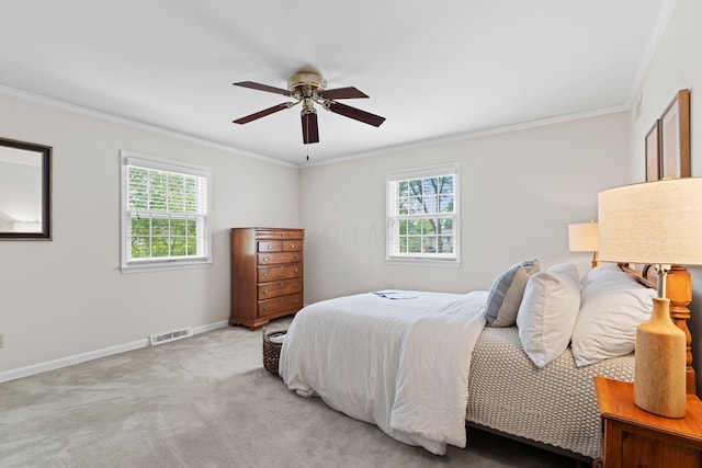 4318 Lyon Dr, Upper Arlington, OH 43220 - bedroom featuring multiple windows, ornamental molding, light colored carpet, and ceiling fan