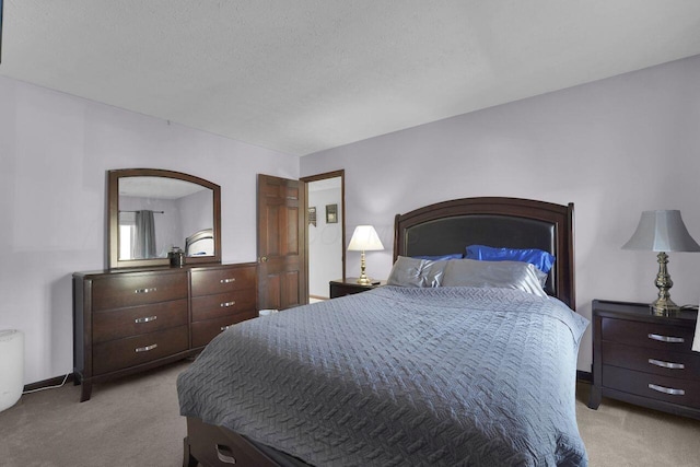 625 Country Club Dr Unit B14, Newark, OH 43055 - bedroom with baseboards and light carpet