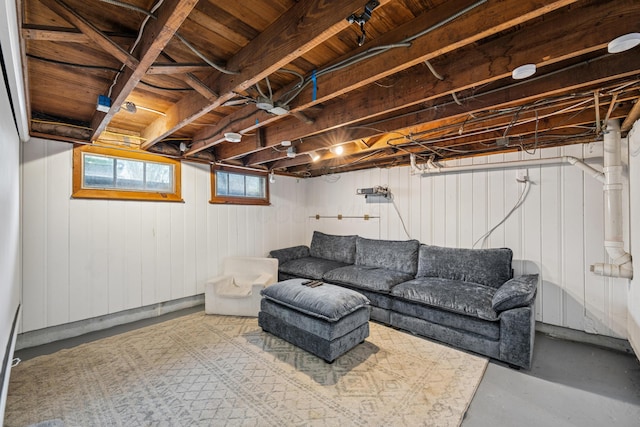 living room featuring finished concrete floors