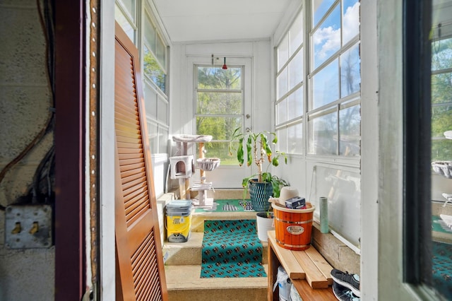 sunroom / solarium featuring a wealth of natural light
