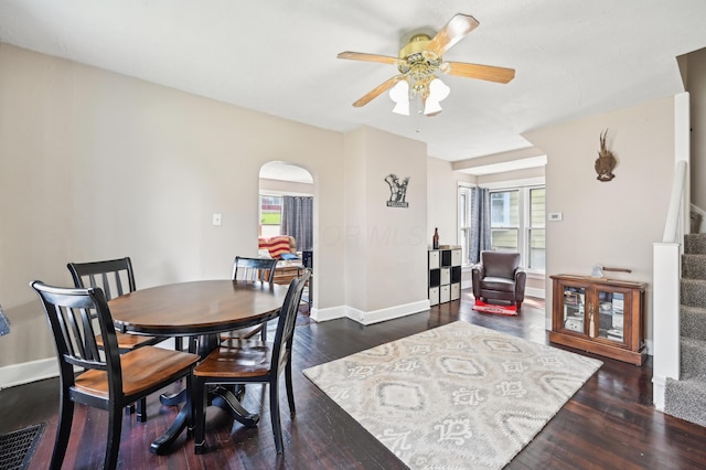 401 S 2nd St, Newark, OH 43055 - dining space with a ceiling fan, baseboards, dark wood finished floors, and stairway