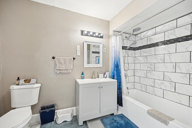 401 S 2nd St, Newark, OH 43055 - bathroom featuring vanity, toilet, baseboards, tile patterned floors, and shower / tub combo