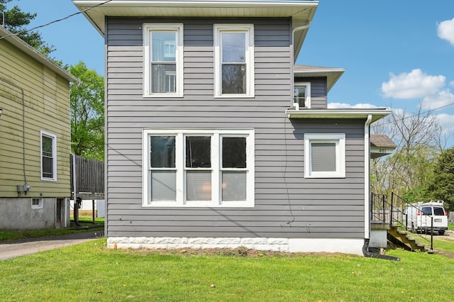 401 S 2nd St, Newark, OH 43055 - view of home's exterior with a lawn and stairway