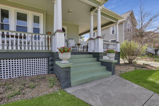 704 E High St, Mount Vernon, OH 43050 - view of exterior entry featuring covered porch