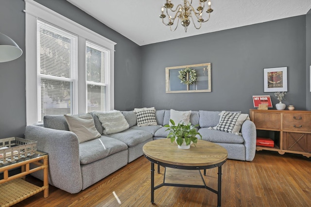 704 E High St, Mount Vernon, OH 43050 - living area with hardwood / wood-style floors and a notable chandelier