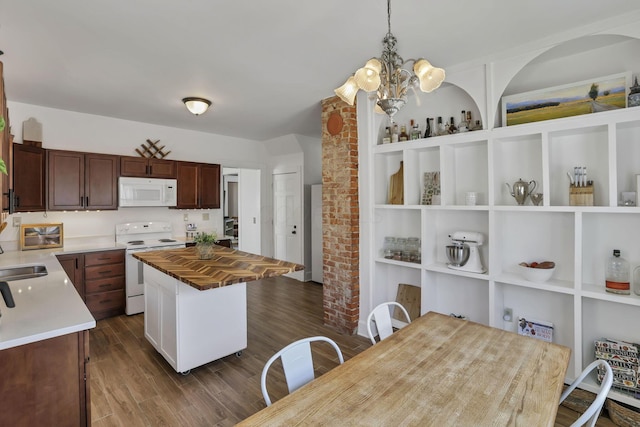 704 E High St, Mount Vernon, OH 43050 - kitchen with a sink, wooden counters, white appliances, a notable chandelier, and dark wood-style floors