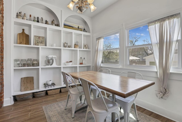 704 E High St, Mount Vernon, OH 43050 - dining space with wood finished floors and an inviting chandelier