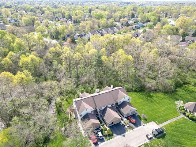 aerial view featuring a residential view and a forest view