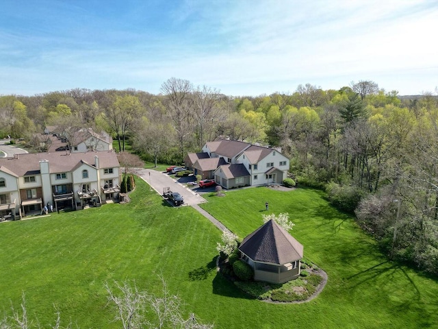 drone / aerial view with a view of trees
