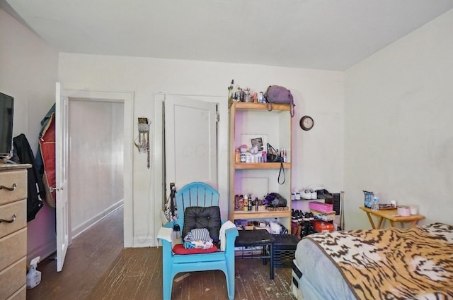 bedroom with wood finished floors