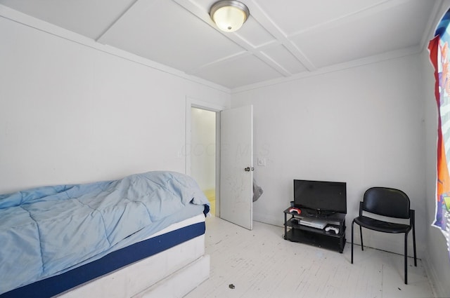 bedroom with wood finished floors