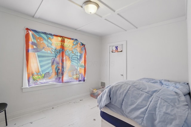 bedroom featuring baseboards