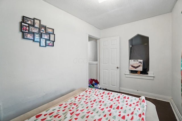 bedroom with baseboards