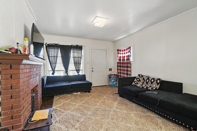 living area featuring crown molding, carpet, and a brick fireplace