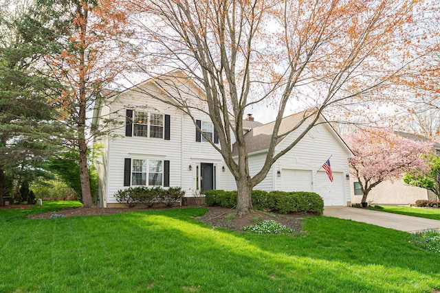 view of front of house featuring an attached garage, a chimney, a front yard, and concrete driveway