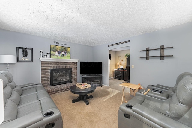 carpeted living area with a textured ceiling and a fireplace
